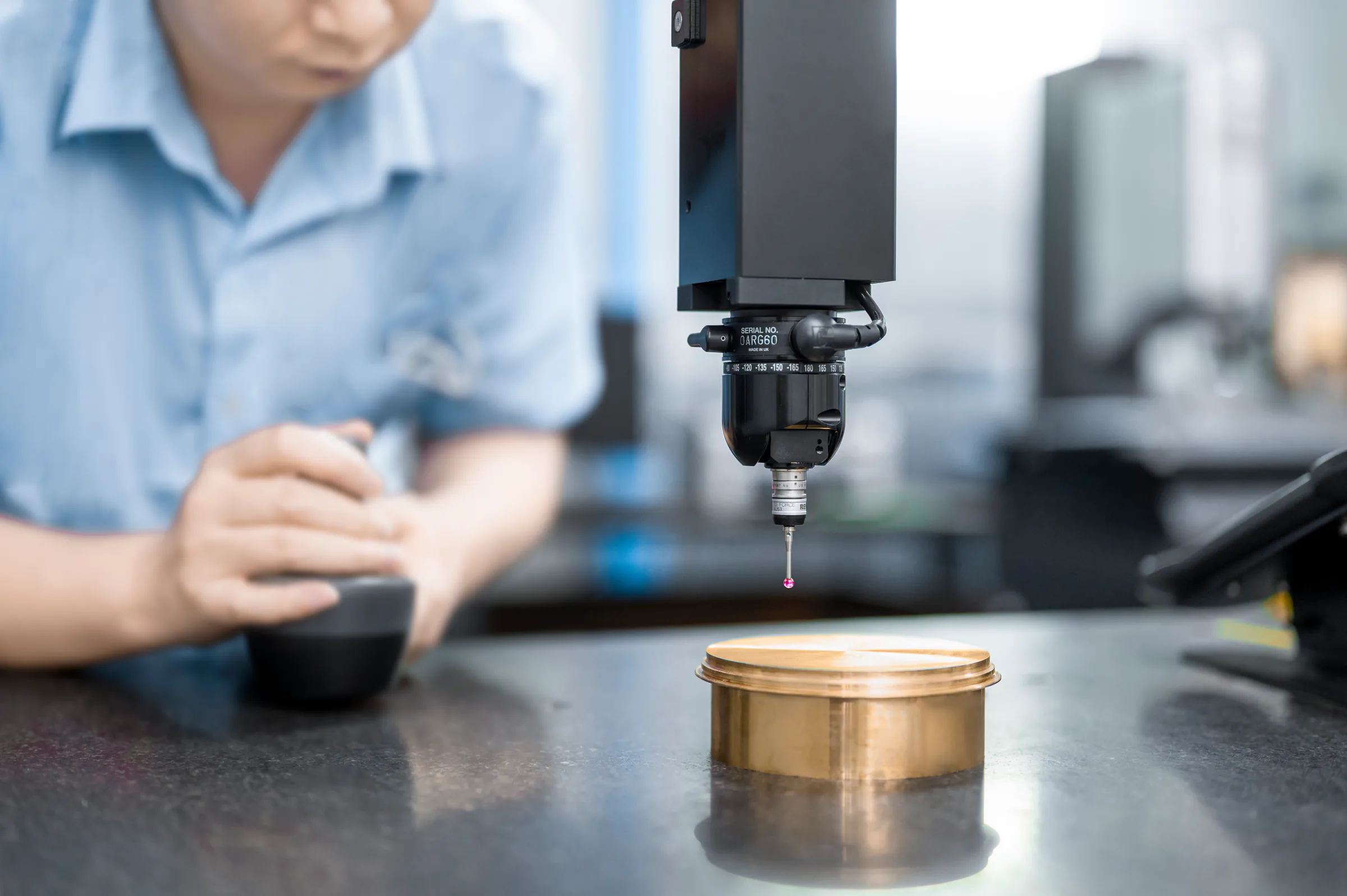 Coordinate measurement probe inspecting a machined component