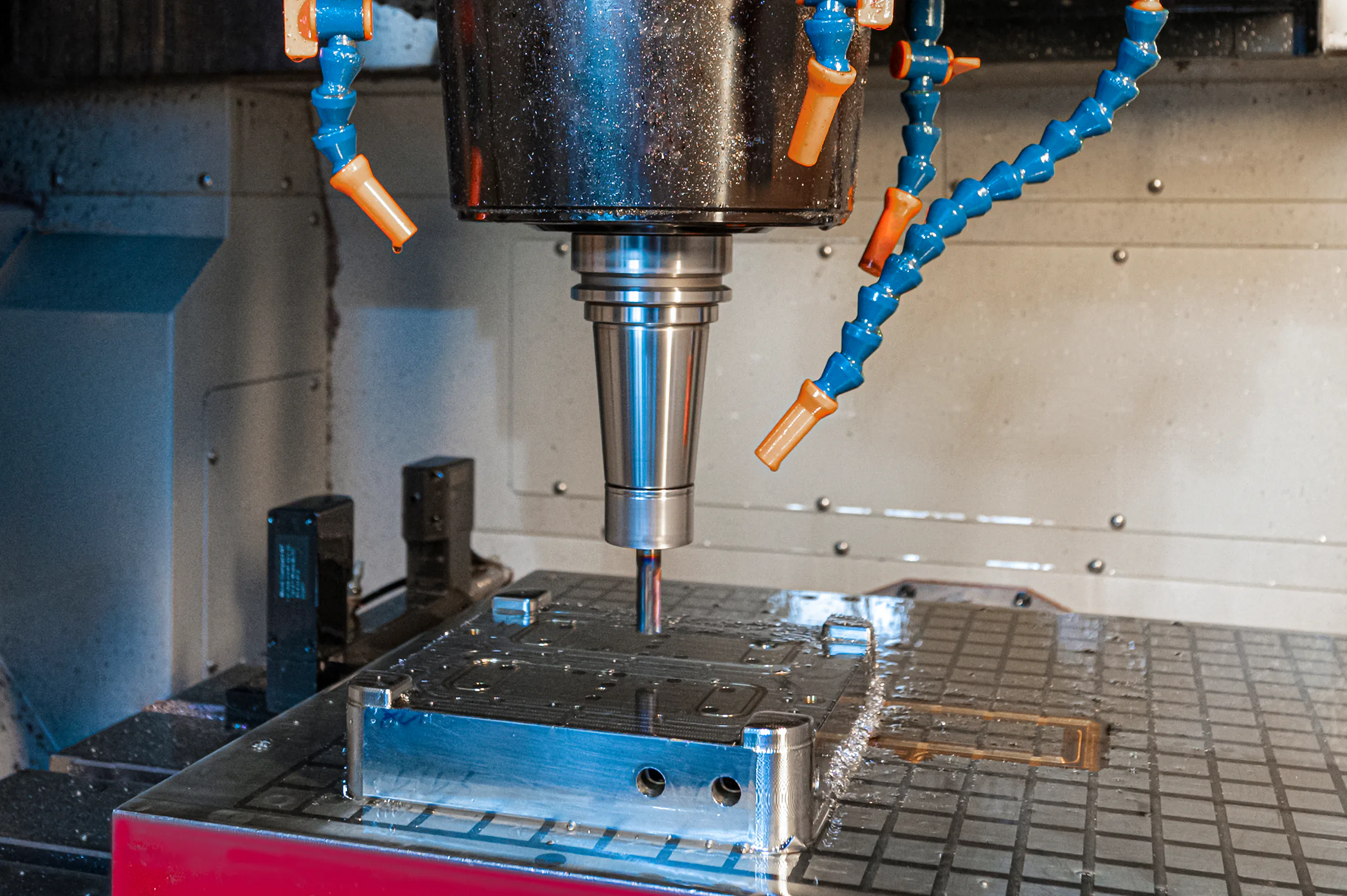 CNC spindle machining a metal tooling surface