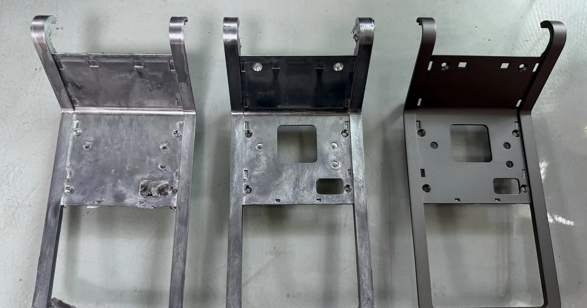 A metal component shown at cast, machined, and surface-finished stages